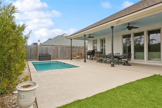 1193 Delta Ln, Covington, LA 70433 - view of pool with ceiling fan, a patio area, and area for grilling