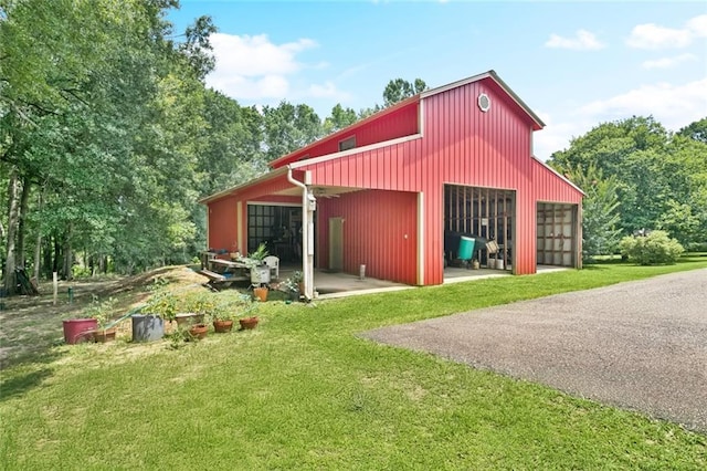 75581 N Hayes Rd, Kentwood, LA 70444 - view of pole building featuring a lawn