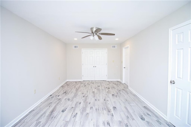 1304 Madewood Rd, La Place, LA 70068 - unfurnished bedroom with light wood-style flooring, a closet, recessed lighting, and ceiling fan