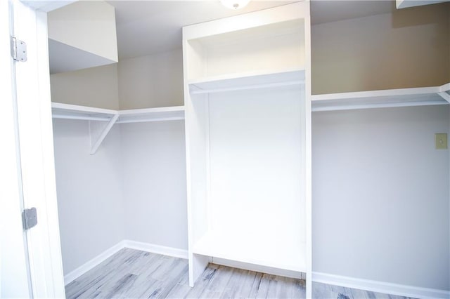 1304 Madewood Rd, La Place, LA 70068 - spacious closet featuring wood finished floors
