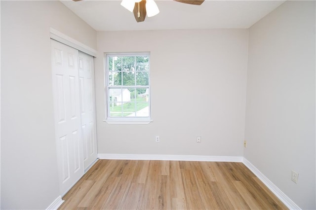 1304 Madewood Rd, La Place, LA 70068 - unfurnished bedroom featuring light wood finished floors, a closet, and a ceiling fan