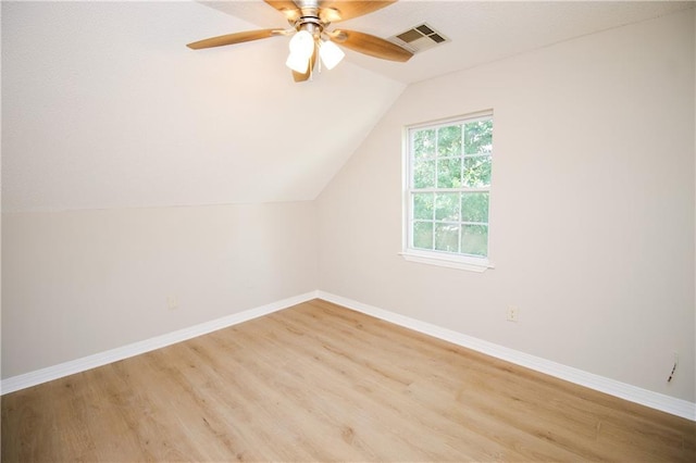 1304 Madewood Rd, La Place, LA 70068 - additional living space with vaulted ceiling, light wood finished floors, and a ceiling fan