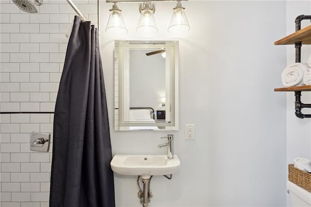1529 St Philip St, New Orleans, LA 70116 - full bath with a tile shower and toilet