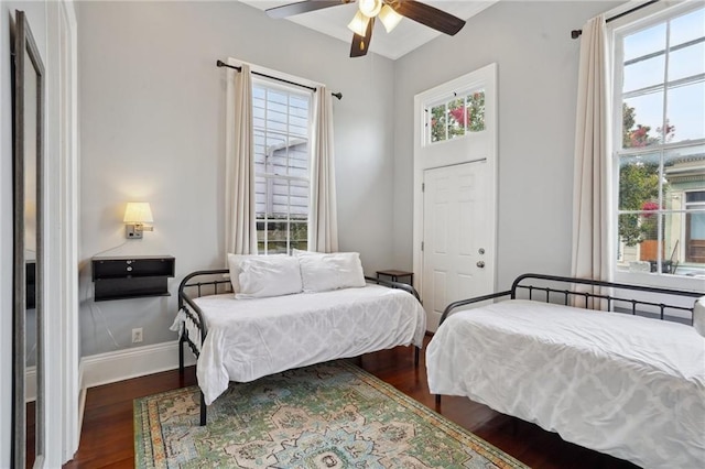 1529 St Philip St, New Orleans, LA 70116 - bedroom with wood finished floors and ceiling fan