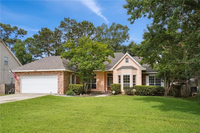 67061 Dolan St, Mandeville, LA 70471 - ranch-style house featuring an attached garage, concrete driveway, roof with shingles, and brick siding