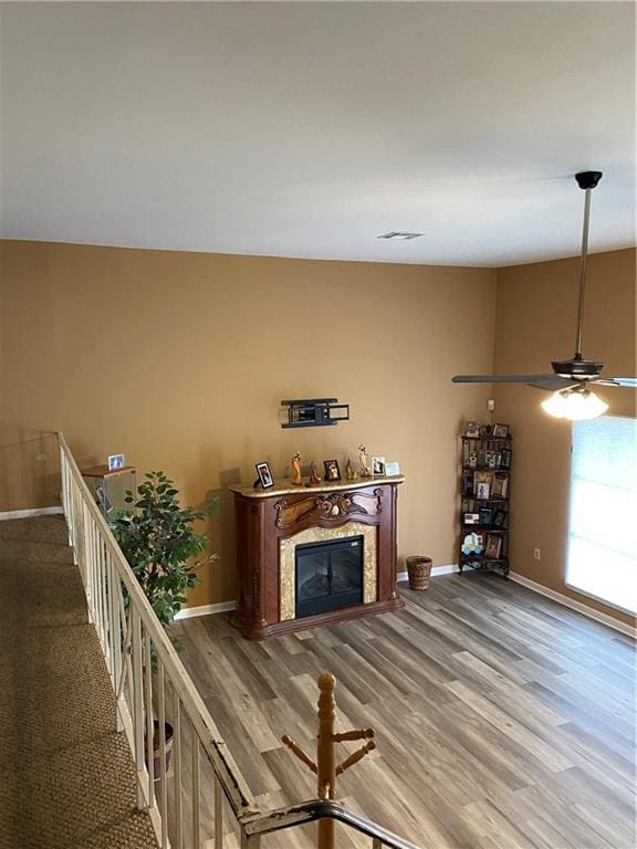 208 Amapola Cir, Terrytown, LA 70056 - living room featuring ceiling fan, wood finished floors, and a high end fireplace