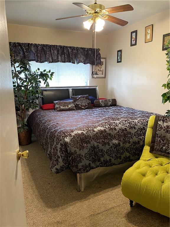 208 Amapola Cir, Terrytown, LA 70056 - bedroom featuring carpet flooring and a ceiling fan