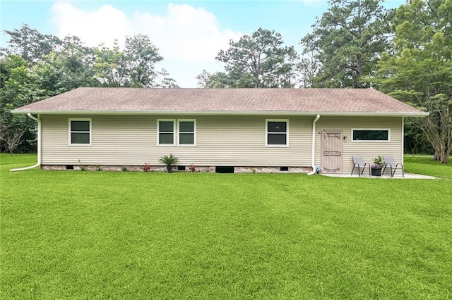 72433 Bullard St, Covington, LA 70435 - back of property with crawl space, a patio area, a yard, and a shingled roof
