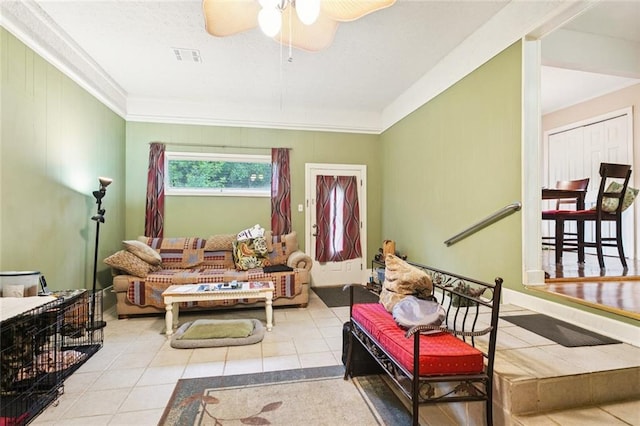 72433 Bullard St, Covington, LA 70435 - tiled living area featuring a ceiling fan and ornamental molding