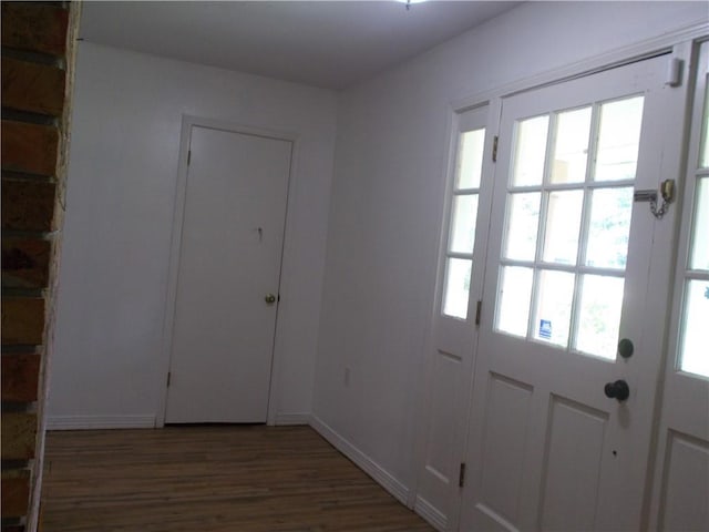 2112 Hamilton St, Franklinton, LA 70438 - doorway to outside featuring wood finished floors and baseboards