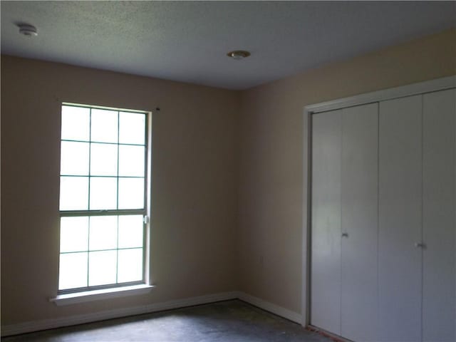 2112 Hamilton St, Franklinton, LA 70438 - unfurnished bedroom featuring baseboards and a closet