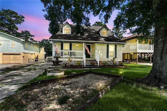 3109 Bayou View Pl, Slidell, LA 70458 - cape cod home with a porch and stairs