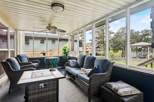 3109 Bayou View Pl, Slidell, LA 70458 - sunroom / solarium featuring outdoor lounge area, ceiling fan, and plenty of natural light