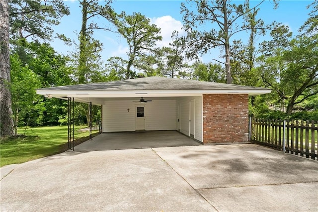 108 N Dr, Covington, LA 70433 - garage featuring concrete driveway and ceiling fan