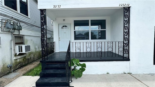 2232 Annette St, New Orleans, LA 70119 - entrance to property with a porch and cooling unit