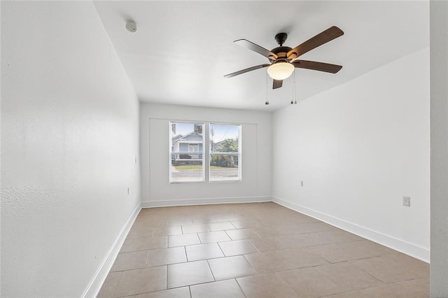 2232 Annette St, New Orleans, LA 70119 - spare room featuring ceiling fan, light tile patterned floors, and a smoke detector