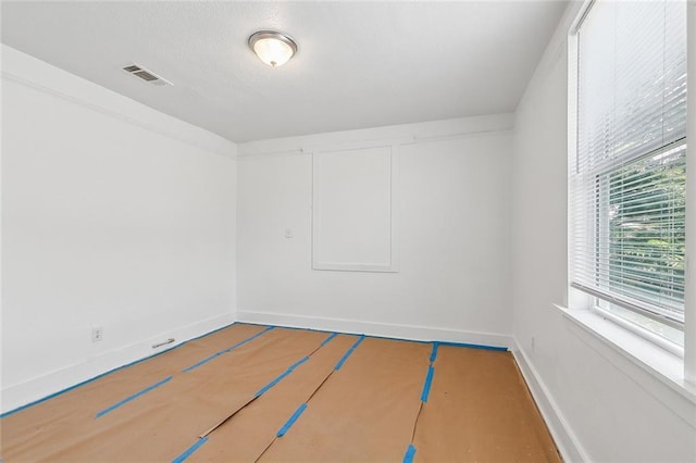 2232 Annette St, New Orleans, LA 70119 - empty room with baseboards