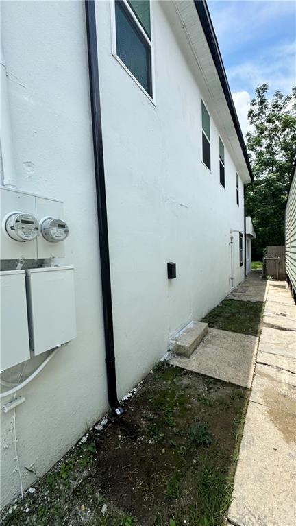 2232 Annette St, New Orleans, LA 70119 - view of home's exterior with stucco siding