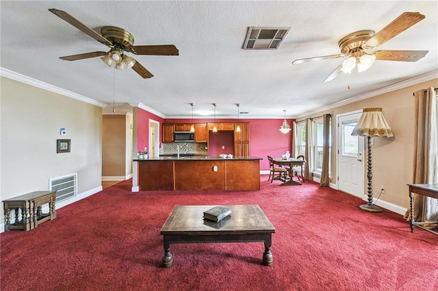 333 Bertolino Dr, Kenner, LA 70065 - living room featuring ceiling fan, dark carpet, and crown molding