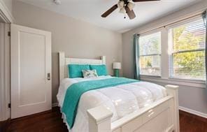 3929 Octavia St, New Orleans, LA 70125 - bedroom featuring dark wood-style flooring and a ceiling fan
