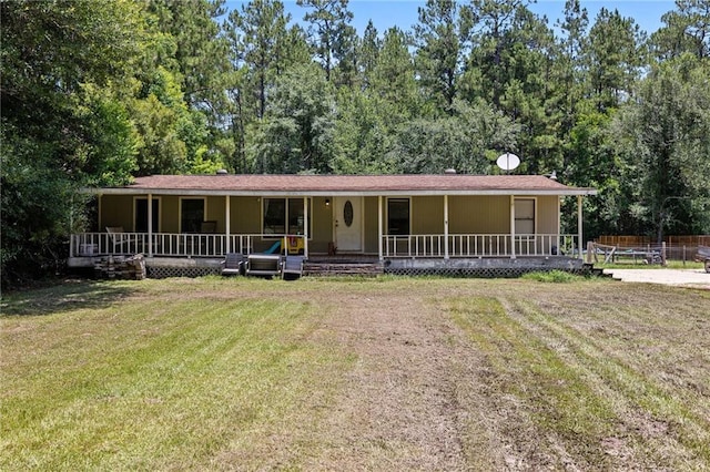 24473 Sanders Rd, Covington, LA 70435 - view of front facade featuring covered porch and a front lawn