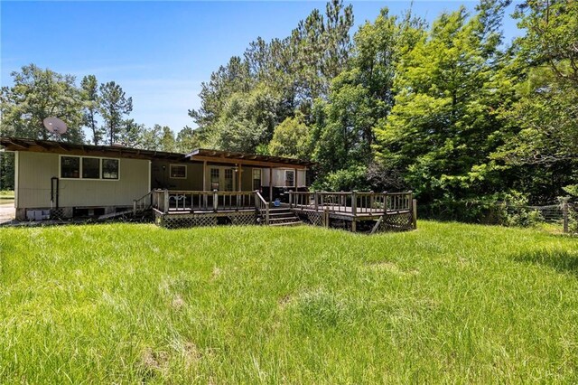 24473 Sanders Rd, Covington, LA 70435 - back of property with a deck