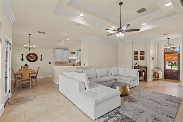 133 Oak Bend Dr, La Place, LA 70068 - living area featuring light tile patterned floors, crown molding, a chandelier, a ceiling fan, and recessed lighting