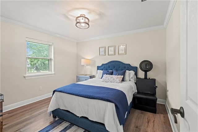 133 Oak Bend Dr, La Place, LA 70068 - bedroom with wood finished floors and ornamental molding