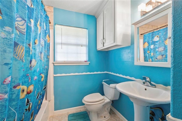 370 Cumberland Dr, Slidell, LA 70458 - bathroom featuring tile patterned flooring and shower / bathtub combination with curtain