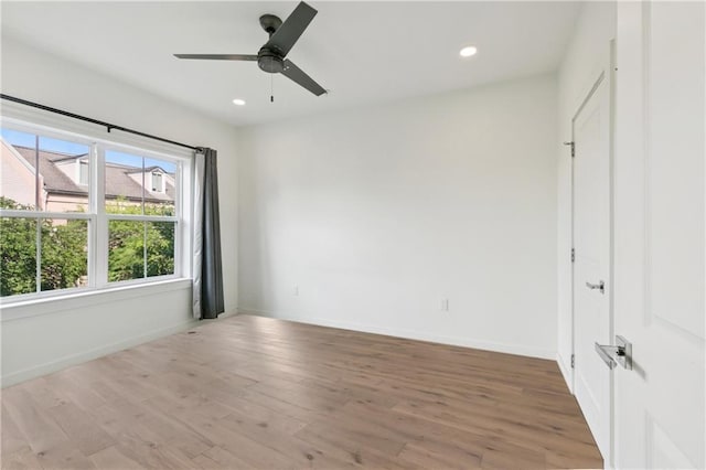 2100 Saint Thomas St Unit 202, New Orleans, LA 70130 - spare room featuring wood finished floors, recessed lighting, and ceiling fan