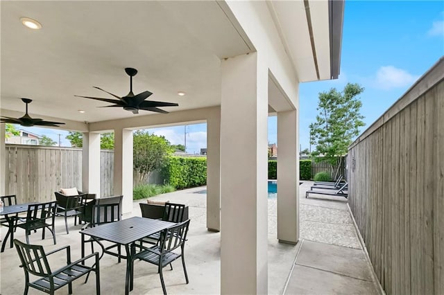 2100 Saint Thomas St Unit 202, New Orleans, LA 70130 - fenced backyard featuring ceiling fan and a patio