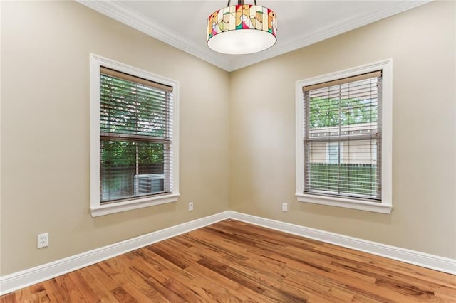 4953 Music St, New Orleans, LA 70122 - spare room with crown molding and wood finished floors