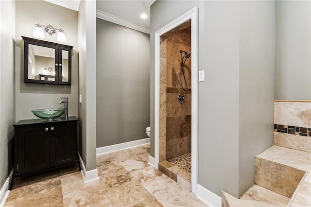 4953 Music St, New Orleans, LA 70122 - full bathroom featuring crown molding, a tile shower, and vanity