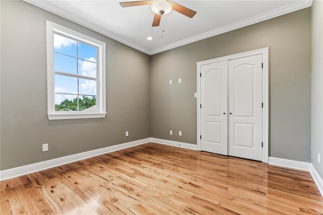 4953 Music St, New Orleans, LA 70122 - unfurnished bedroom with ornamental molding, light wood finished floors, a closet, a ceiling fan, and recessed lighting