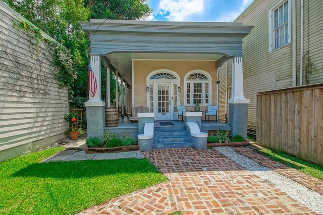 1025 General Pershing St, New Orleans, LA 70115 - entrance to property with a porch
