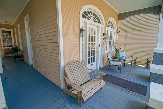 1025 General Pershing St, New Orleans, LA 70115 - porch featuring french doors