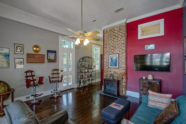 1025 General Pershing St, New Orleans, LA 70115 - living area with wood finished floors, a ceiling fan, and ornamental molding