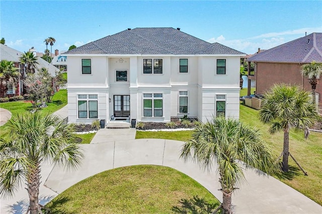251 Oakmont Dr, New Orleans, LA 70128 - rear view of property featuring a yard, stucco siding, and roof with shingles