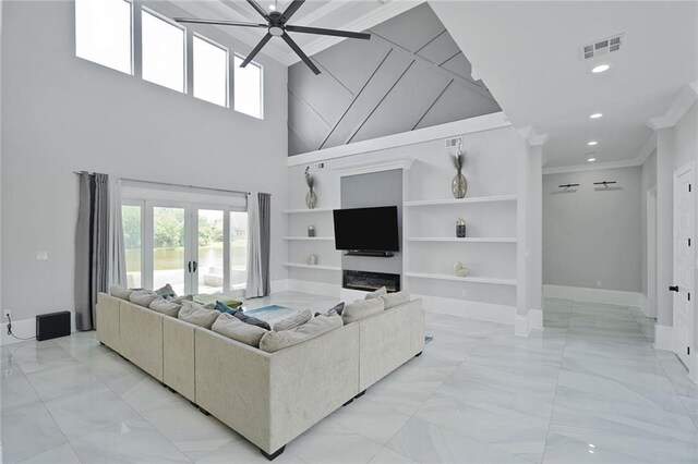 251 Oakmont Dr, New Orleans, LA 70128 - living room featuring light marble finish floors, ceiling fan, plenty of natural light, ornamental molding, and recessed lighting