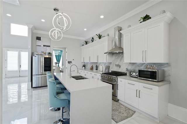 251 Oakmont Dr, New Orleans, LA 70128 - kitchen featuring stainless steel appliances, wall chimney range hood, light countertops, white cabinets, and tasteful backsplash