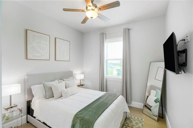 251 Oakmont Dr, New Orleans, LA 70128 - bedroom featuring a ceiling fan and light wood-style flooring