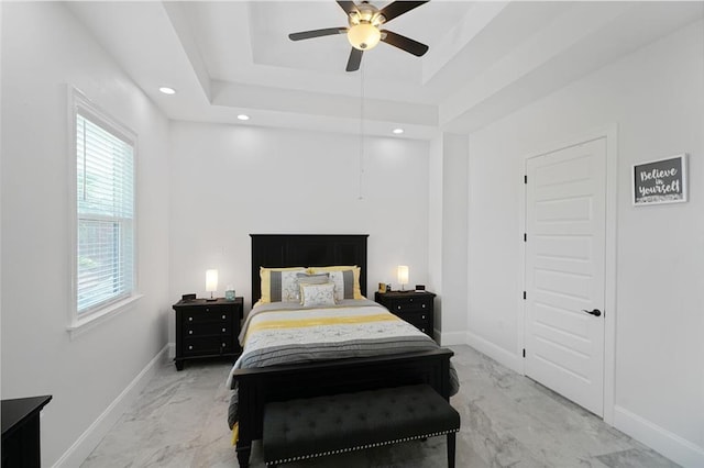 251 Oakmont Dr, New Orleans, LA 70128 - bedroom with light marble finish floors, multiple windows, recessed lighting, and a raised ceiling