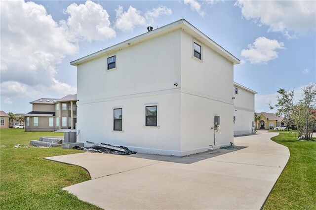251 Oakmont Dr, New Orleans, LA 70128 - back of house with a lawn and a patio
