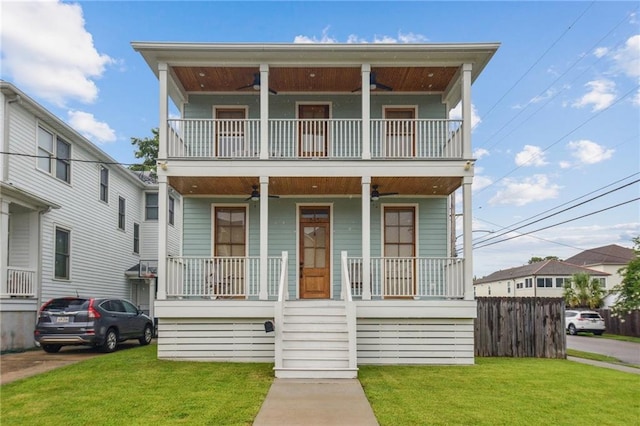 845 Pontalba St, New Orleans, LA 70124 - view of front of home with a balcony, a porch, ceiling fan, and stairs
