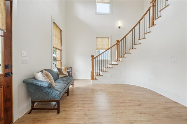 845 Pontalba St, New Orleans, LA 70124 - entrance foyer featuring a towering ceiling, hardwood / wood-style flooring, and stairway