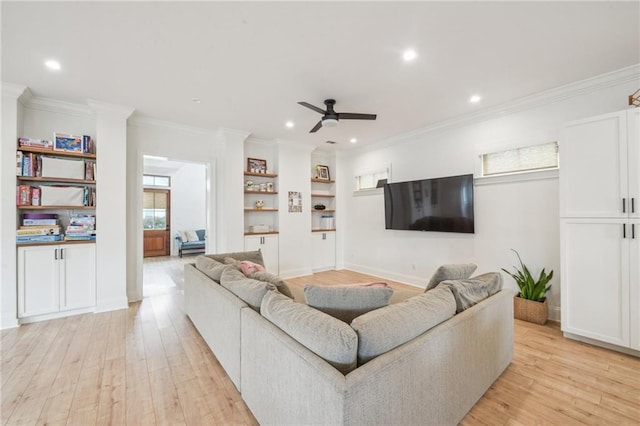 845 Pontalba St, New Orleans, LA 70124 - living area with light wood-style floors, a ceiling fan, crown molding, recessed lighting, and built in features