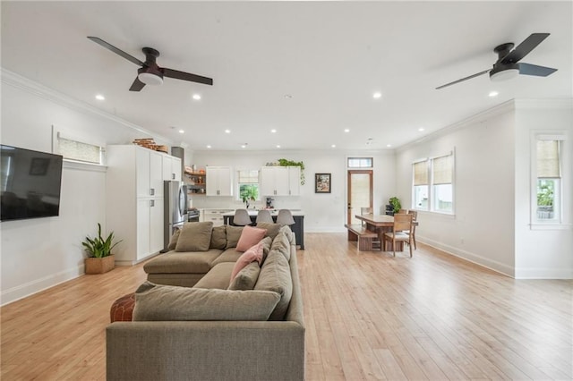 845 Pontalba St, New Orleans, LA 70124 - living room with a ceiling fan, crown molding, light wood-style flooring, and recessed lighting