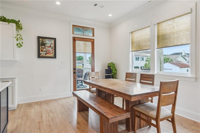 845 Pontalba St, New Orleans, LA 70124 - dining room featuring ornamental molding, light wood-style floors, and recessed lighting