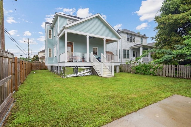845 Pontalba St, New Orleans, LA 70124 - view of front of property with a fenced backyard, stairway, ceiling fan, and covered porch