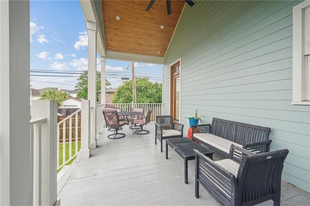 845 Pontalba St, New Orleans, LA 70124 - wooden deck with outdoor dining area, ceiling fan, and an outdoor hangout area
